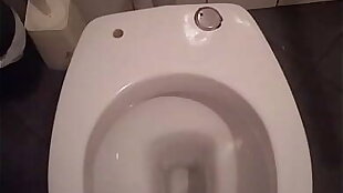 Masturbating in public toilet